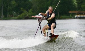 extreme ironing while surfing