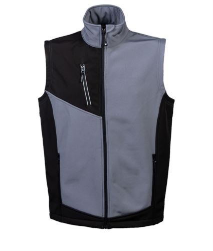 Gilet uomo in softshell a tre strati impermeabile (8000 mm/H2O) e traspirante (1000 g/M2/24h). Parte interna in pile antipilling e coulisse sul fondo. Due tasche esterne con zip. Una tasca sul petto con zip nastrata rinfrangente su tessuto nero. Nastro di rinforzo interno al collo. Stampa rifrangente posteriore sul fianco. Tessuto a protezione del mento.