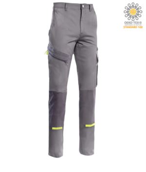 Two tone multi pocket trousers, possibility of toggle insertion, contrasting details. Colour grey