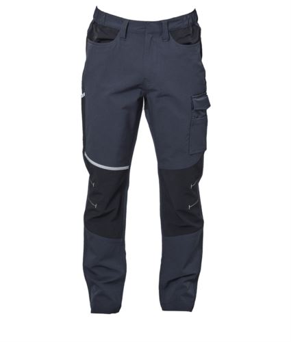 Pantaloni multitasche elasticizzati in tessuto 4 stretch, triple cuciture. Due tasche anteriori. Una tasca laterale con velcro, una piccola tasca aperta e un passante per utensili. Una tasca posteriore con zip con nastratura rifrangente. Una tasca laterale posteriore portametro o portautensili, con banda rifrangente. Tessuto antiabrasione elasticizzato sulle ginocchia con impunture rifrangenti. Elastici in vita con passanti maggiorati. Bottone automatico in vita coperto.